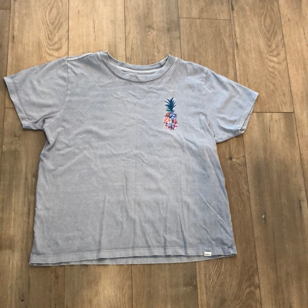 O’Neill tee shirt.